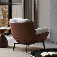 Italian minimalist lounge chair — a comfortable single-seat sofa.